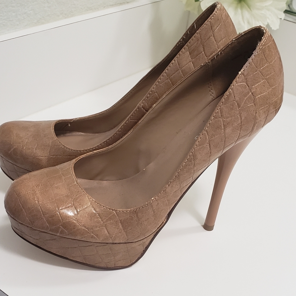 Call it spring Nude pumps